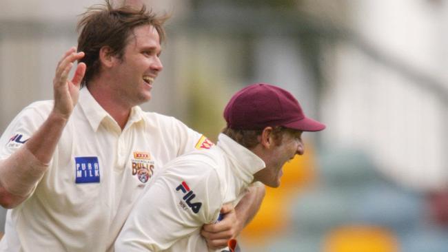 Damien MacKenzie celebrates with Wade Seccombe in a Shield clash. Pic David/Kapernick