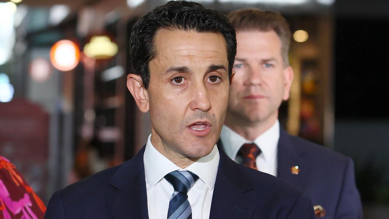 Premier David Crisafulli (front) and Deputy Premier Jarrod Bleijie at Westfield Chermside shopping centre in Brisbane on Wednesday