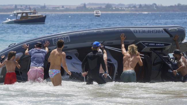 A freak wave capsized a boat. Picture: Valeriu Campan