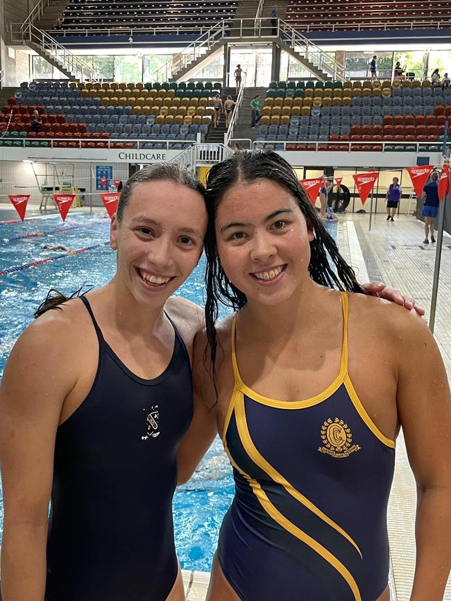 St Margaret's Sophie Martin, left, and Clayfield College's Hana Costello had a 200m IM battle, won by Martin.