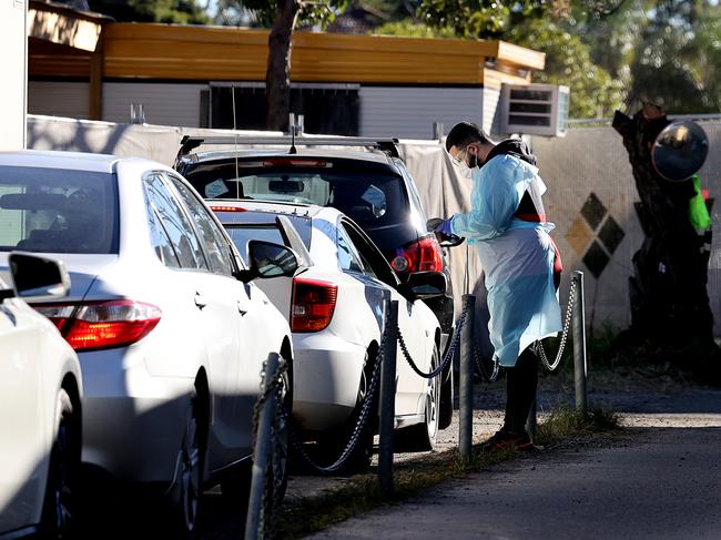 Cars queue at a Covid-19 testing clinic in Bankstown where cases are spiking. Picture: NCA NewsWire/Dylan Coker