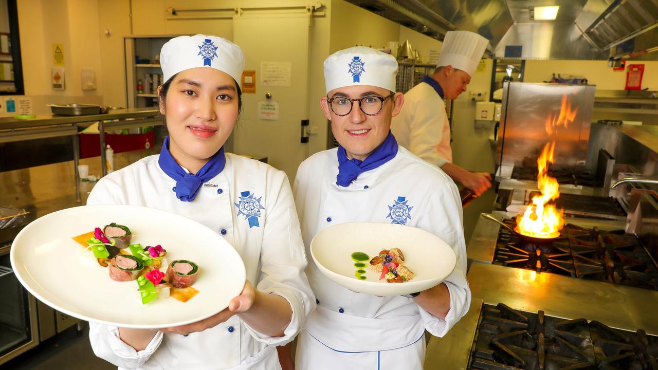 Alexis Lee and Harri King are cooking students at Le Cordon Blue, where the team will prepare a five star menu at a fraction of the price of going to a restaurant. Picture: Tim Carrafa