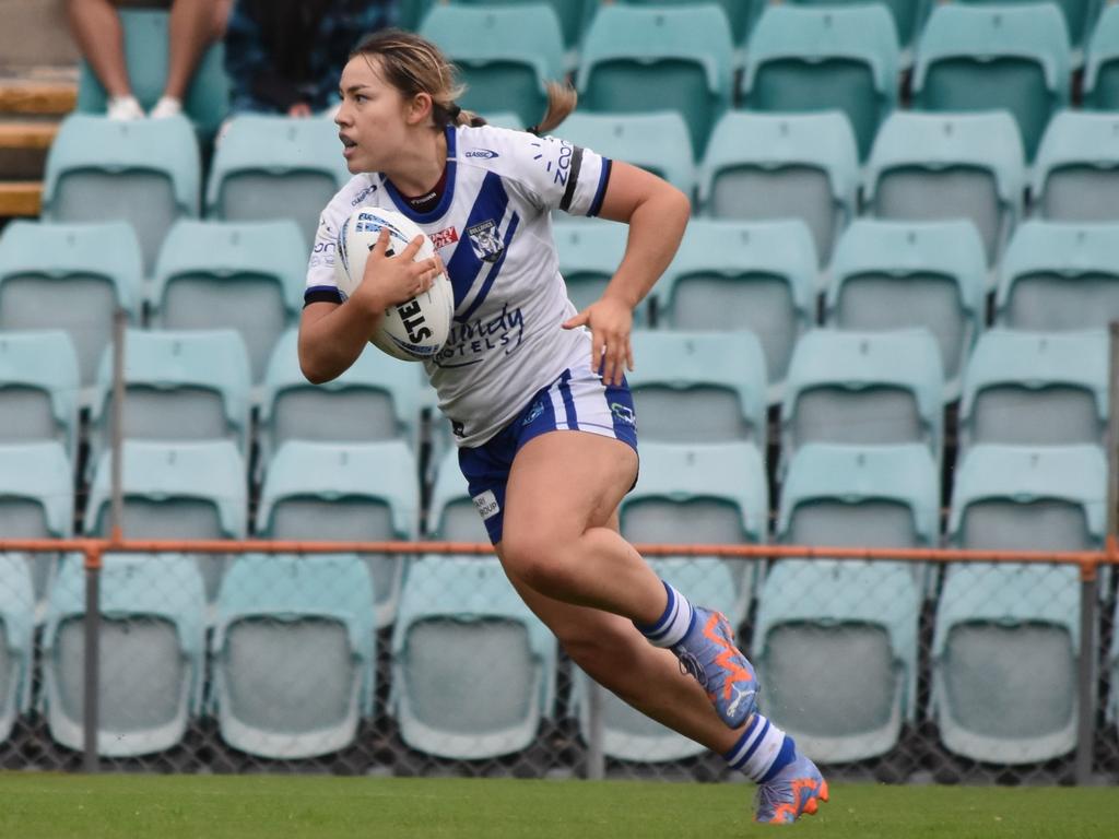 Abby Aros taking a trademark charge at the defensive line. Picture: Sean Teuma/NewsLocal