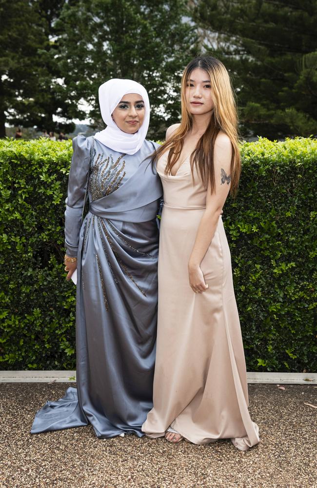 Zahraa Kiream (left) and An Nguyen at Centenary Heights State High School formal at Picnic Point, Friday, November 15, 2024. Picture: Kevin Farmer