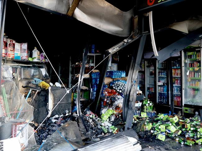 SYDNEY, AUSTRALIA - NewsWire Photos MAY 6, 2025: Police pictured at a crime scene at the Mount Pritchard Supermarket on Meadows Road after a ute crashed into the shop and a fire was started around 1am last night. Picture: NewsWire / Damian Shaw