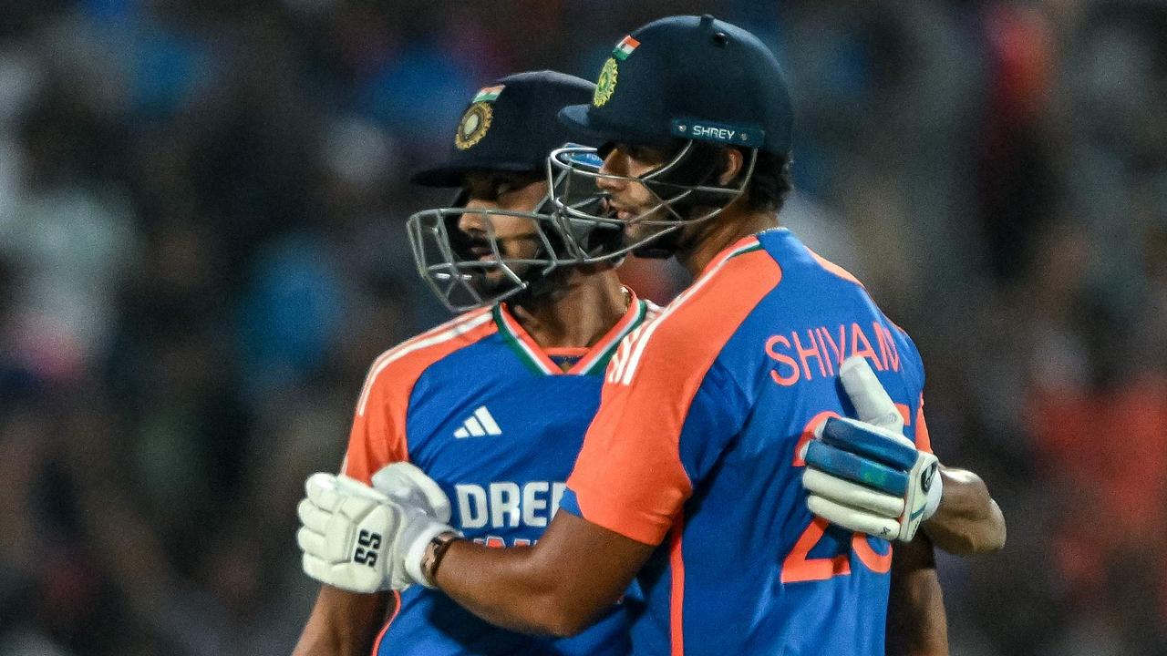 India's Shivam Dube celebrates with his teammate Axar Patel after scoring a half-century. Picture: INDRANIL MUKHERJEE / AFP