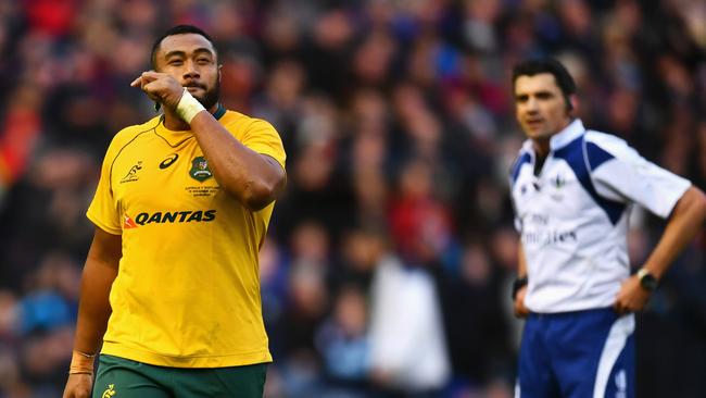 Sekope Kepu leaves the Murrayfield pitch after being issued with a red card.