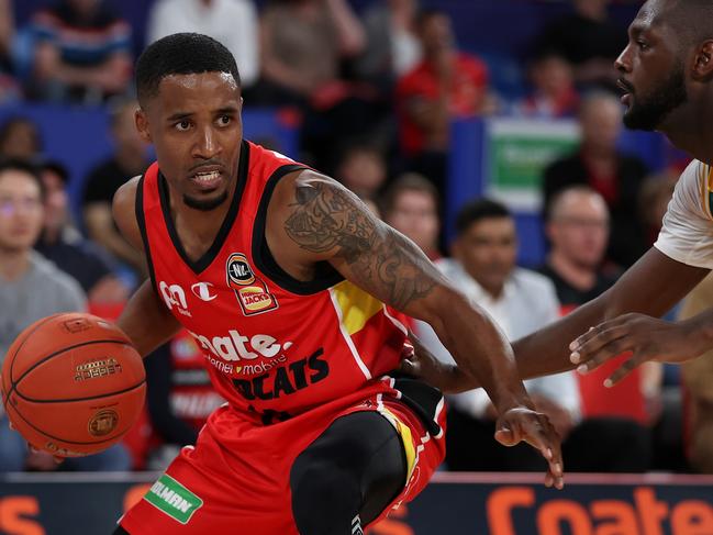 Bryce Cotton is guarded by JackJumpers star Milton Doyle during a game earlier this season. (Photo by Paul Kane/Getty Images)