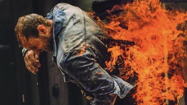 Stuntman Nathan Kannegiesser is set on fire as part of a stunt demonstration at a film festival. Picture: Supplied