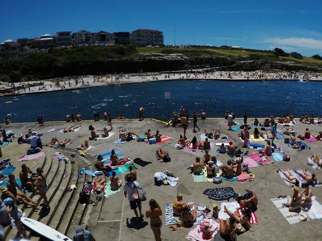 Hundreds of people tried to keep cool at Clovelly yesterday. Picture: Jenny Evans