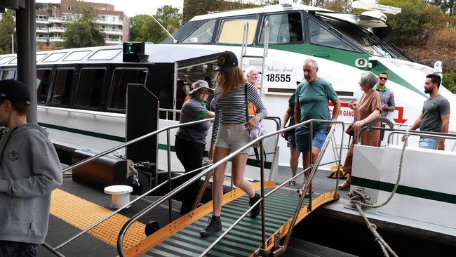 Commuters disembark the Betty Cuthbert Rivercat at Parramatta. Picture: Angelo Velardo