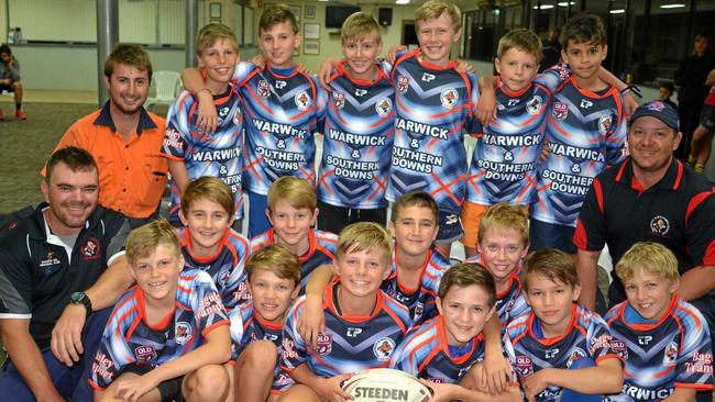 WINNERS: The Warwick and Southern Downs under-43kg rugby league team (front, from left) Kye Lawler, Mark Hallman, Samuel Wainwright, Jack Talbot, Nikolas Talbot, Riley Wainwright, (middle) trainer Daniel Talbot, Brae Willman, Jack Herald, Bailey Nicholls, Max Doyle, coach Ross Thorne, (back) trainer Bradley Morrish, Fletcher Tate-Roche, Jesse Scanlan, Liam Johnston, William Riley, Nicholas Sweet and Clarence Walker. Picture: Gerard Walsh