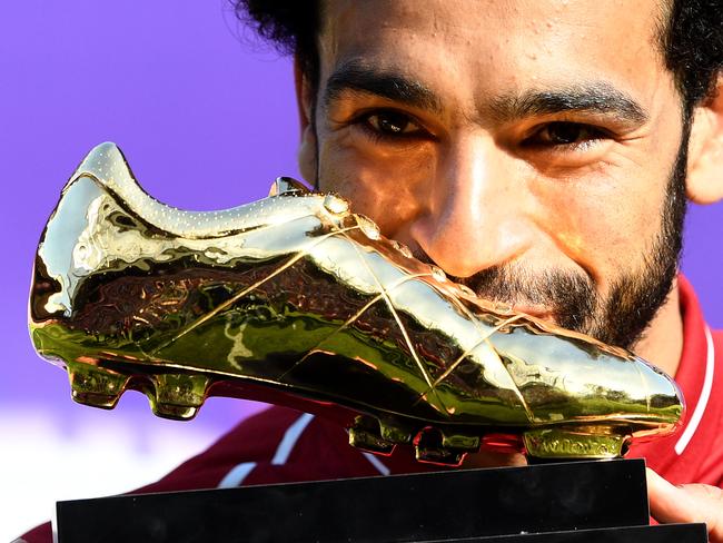 Mohamed Salah poses for a photo with his Premier League Golden Boot Award.