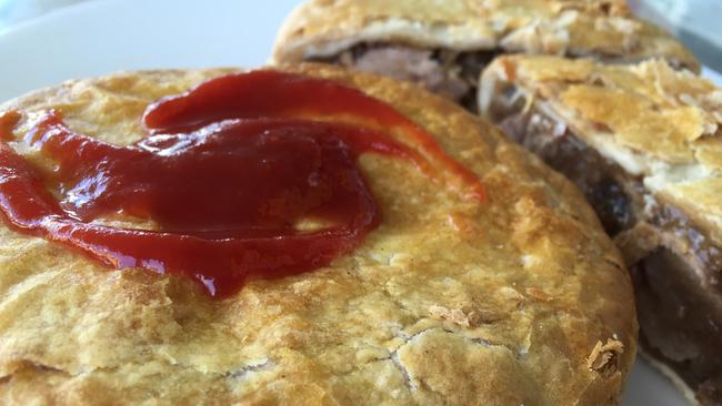 La Bakehouse Cafe’s meat pie with sauce.