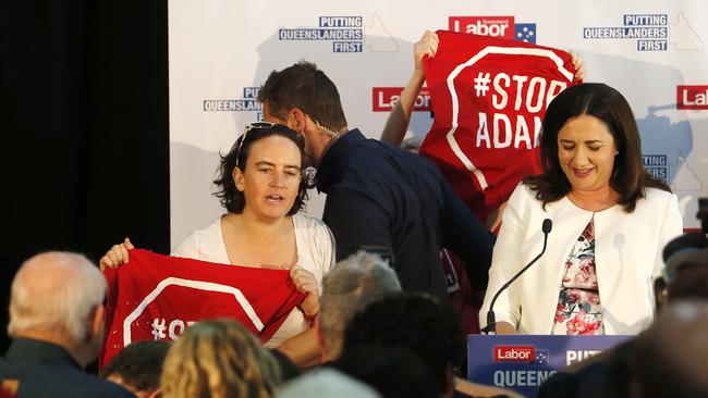 Adani coal mine protesters gatecrash Annastacia Palaszczuk this week. Picture: AAP Image/Josh Woning