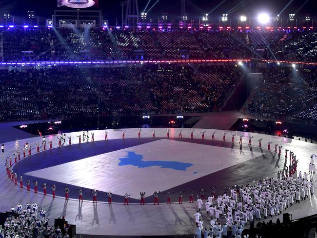 Athletes from South Korea and North Korea arrive during the opening ceremony of the 2018 Winter Olympics in Pyeongchang. Picture: Christof Stache/Pool Photo via AP.