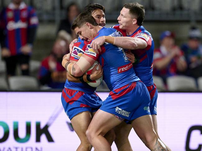 Enari Tuala of the Knights celebrates scoring a try with team mates during the round 27 NRL match between St George Illawarra Dragons and Newcastle Knights at Netstrata Jubilee Stadium on September 02, 2023 in Sydney, Australia. (Photo by Brett Hemmings/Getty Images)