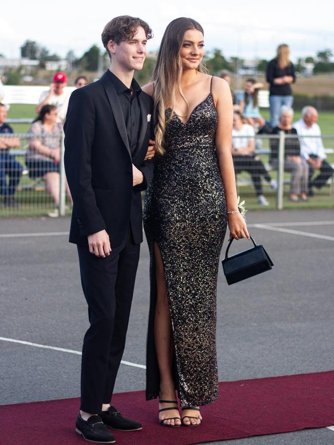 Luke Devlin and Tamae Marschke arrived in a 1969 Ford Mustang.