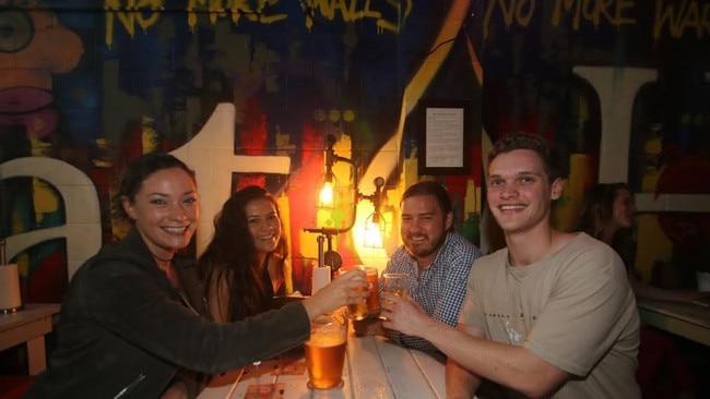 Locals enjoying a beer at the Cave Inn.