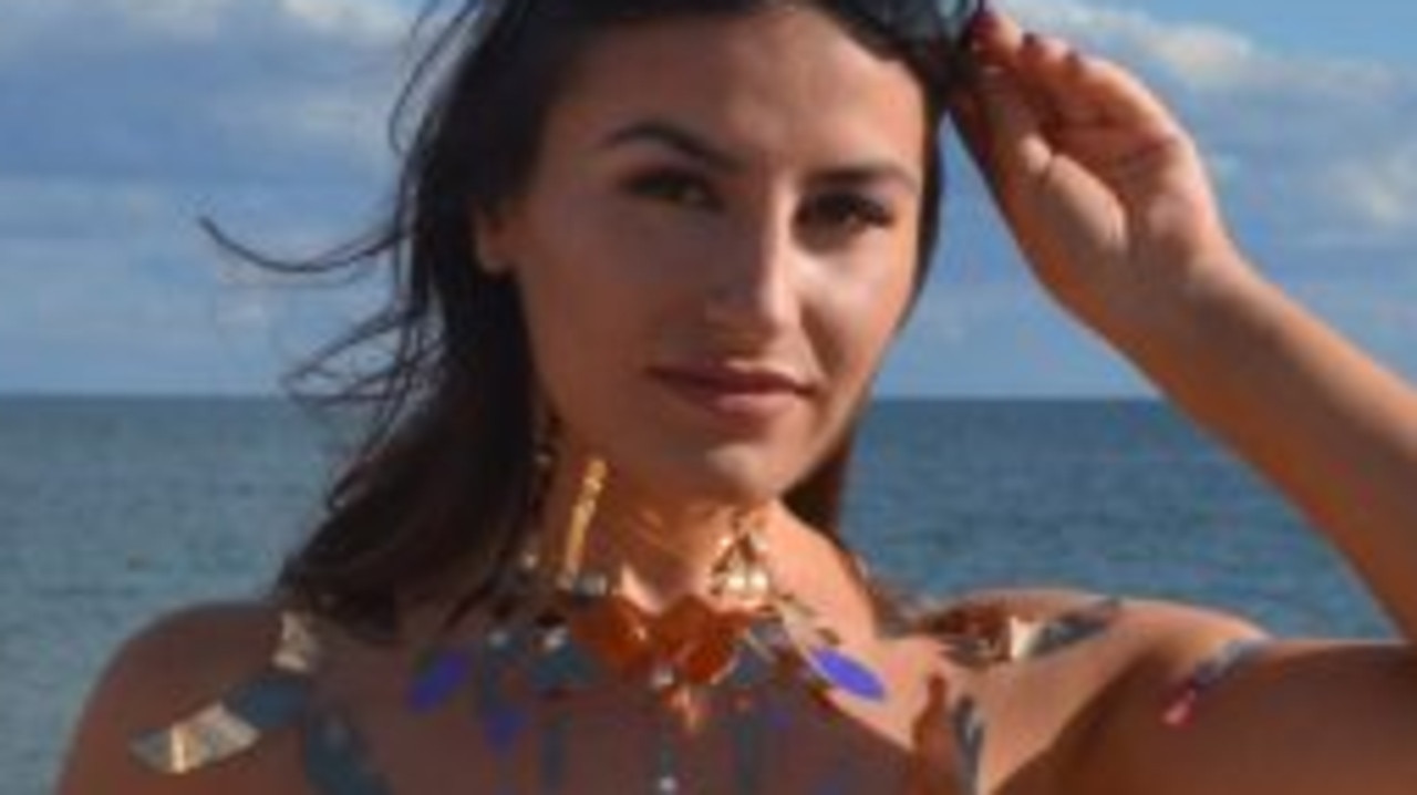 Brave Fabulous Digital reporter Deni Kirkova hit the beach wearing a metallic duct tape 'bikini. Picture: Alida Browne/The Sun