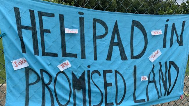 A sign on the soccer fields leading into Bellingen in opposition to the proposed helipad at the Hermes Estate on Promised Land Rd, Gleniffer.