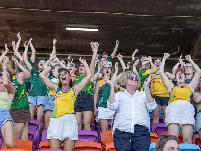 PINT supporters and players celebrate their premier women's team win in the NTFL prelim final. Picture: Floss Adams.