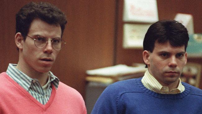 (FILES) Erik Menendez (L) and his brother Lyle (R) listen during a pre-trial hearing, on December 29, 1992 in Los Angeles after the two pleaded innocent in the August 1989 shotgun deaths of their wealthy parents, Jose and Mary Louise Menendez of Beverly Hills, California. Lyle and Erik Menendez, the two brothers whose grisly murder of their parents in their swanky Beverly Hills home gripped the United States and was the subject of a recent Netflix series, could be released from prison after Los Angeles' chief prosecutor said October 24 he would ask a judge to look again at their sentences. (Photo by VINCE BUCCI / GETTY IMAGES NORTH AMERICA / AFP)