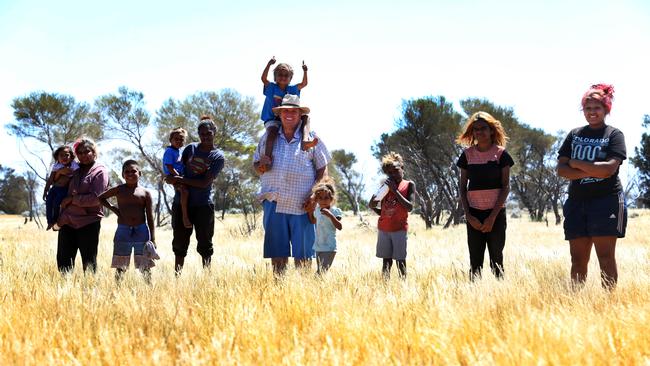 Charlie Klein with students from the Tjuntjuntjara school. Picture: James Croucher