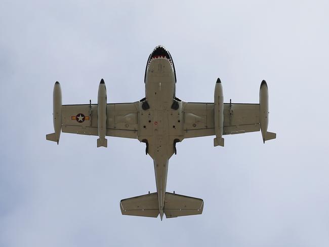 A fighter jet flys by as part of the deputy mayor’s wedding festivities. Picture: Toby Zerna