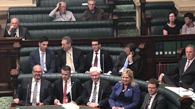 Liberal MPs Fraser Ellis, Steve Murray, Dan Cregan and Nick McBride sit with Labor MPs in Parliament after crossing the floor. Picture: Adam Langenberg