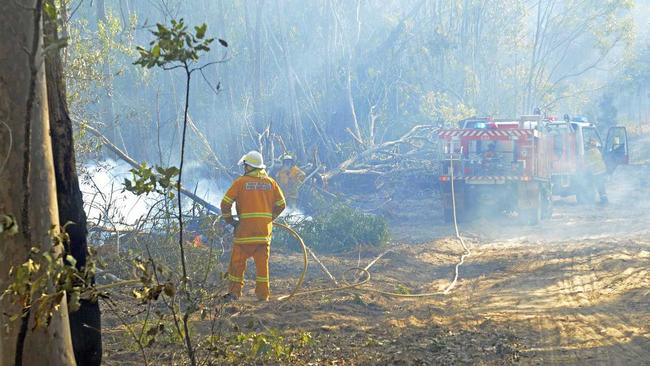 Clarence Valley Rural Fire Service crews battle to put out a spot fire that jumped containment lines of an out of control bushfire at Whiteman Creek west of Grafton on Saturday, 10th August, 2019. Picture: Bill North