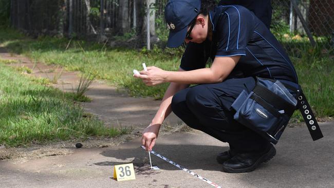 Police investigate blood on the footpath near where an alleged police shooting of a young Aboriginal man happen in Palmerston suburb of Gray. Picture: (A)manda Parkinson