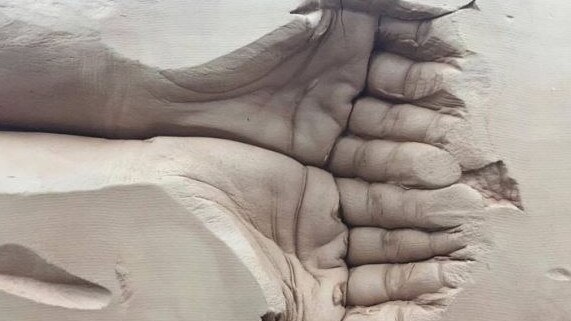 The giant sculpted hands which are proposed for the entrance to the tower. Picture: Supplied by Gold Coast City Council