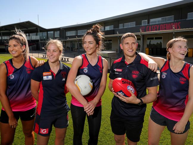 05/12/2018: Casey VNL Netballers Emily Wilson, Karli Foster & Kassidy Withers with AFLW player Katherine Smith & VFL player Mitch Lewis at Casey fields in Victoria. Stuart McEvoy/The Australian.