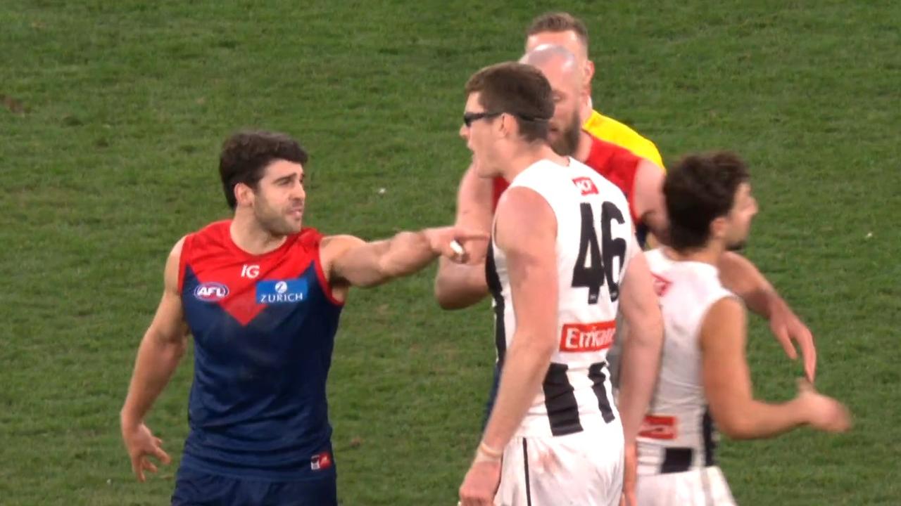 Mason Cox and Christian Petracca had words. Photo: Fox Footy.