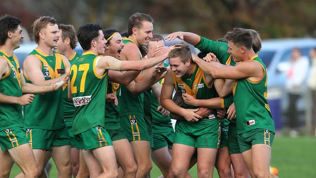 Jenson Garnham is surrounded by Leongatha teammates after kicking his 10th goal on Saturday. Picture: Yuri Kouzmin