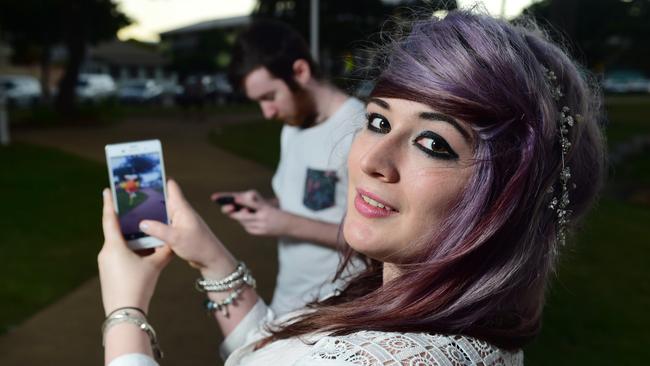 Christian Thorpe and Nikki Schumann with Pokemon Go on the Strand. Picture: Evan Morgan