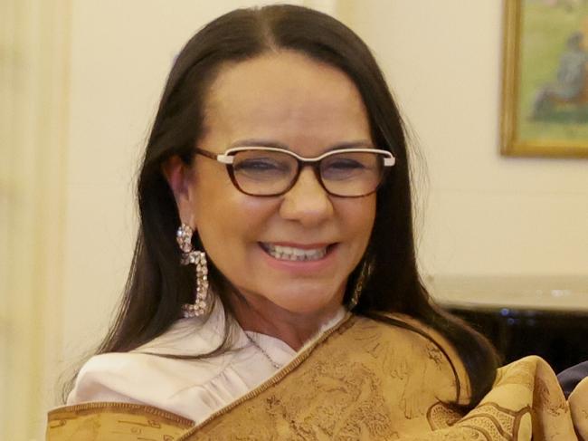 CANBERRA, AUSTRALIA - JUNE 01: Linda Burney Australian Minister for Indigenous Australians is congratulated by Australian Governor-General David Hurley as Prime Minister Anthony Albanese claps during a swearing-in ceremony at Government House on June 01, 2022 in Canberra, Australia. Prime Minister Anthony Albanese unveiled his new cabinet on Tuesday following the Labor party's victory in the Australian Federal election on 21 May 2022. (Photo by Jenny Evans/Getty Images)