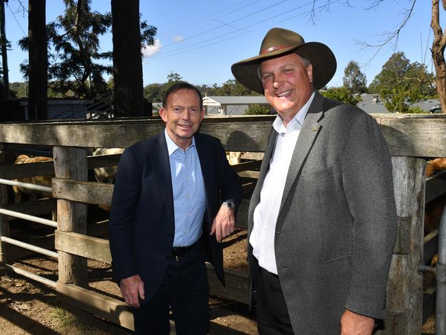 Former prime minister Tony Abbott has joined campaigning for LNP candidate for Longman Trevor Ruthenberg. Picture: AAP Image/Mick Tsikas