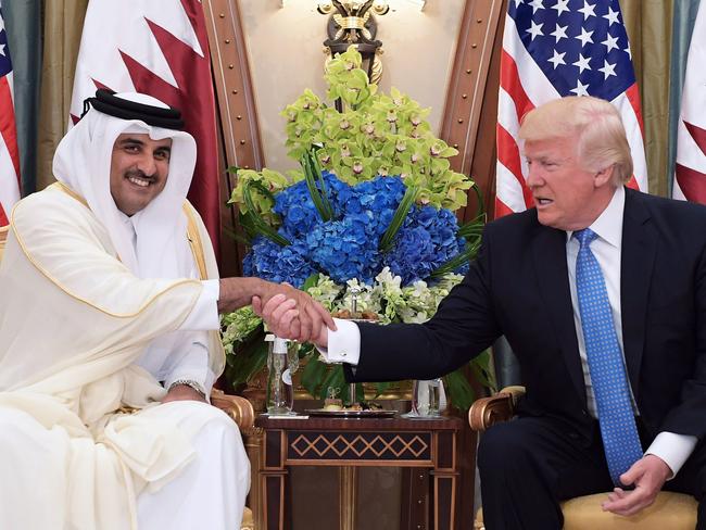 US President Donald Trump shakes hands with Qatar's Emir Sheikh Tamim Bin Hamad al-Thani, during a bilateral meeting at a hotel in the Saudi capital Riyadh. Picture: Mandel Ngan/AFP