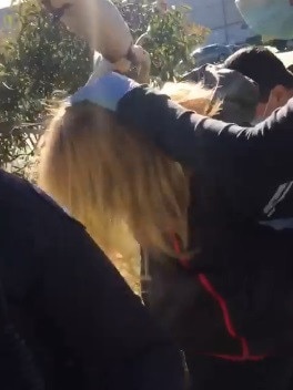 The woman was protesting at a busy Hoppers Crossing intersection. Picture: Facebook.