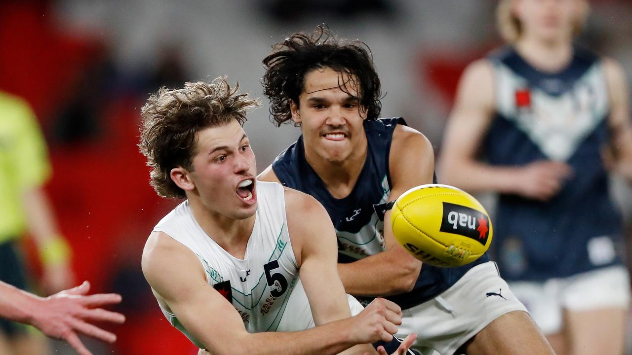 Jhye Clark is tackled by Alwyn Davey Jr. Picture: Dylan Burns/AFL Photos via Getty Images