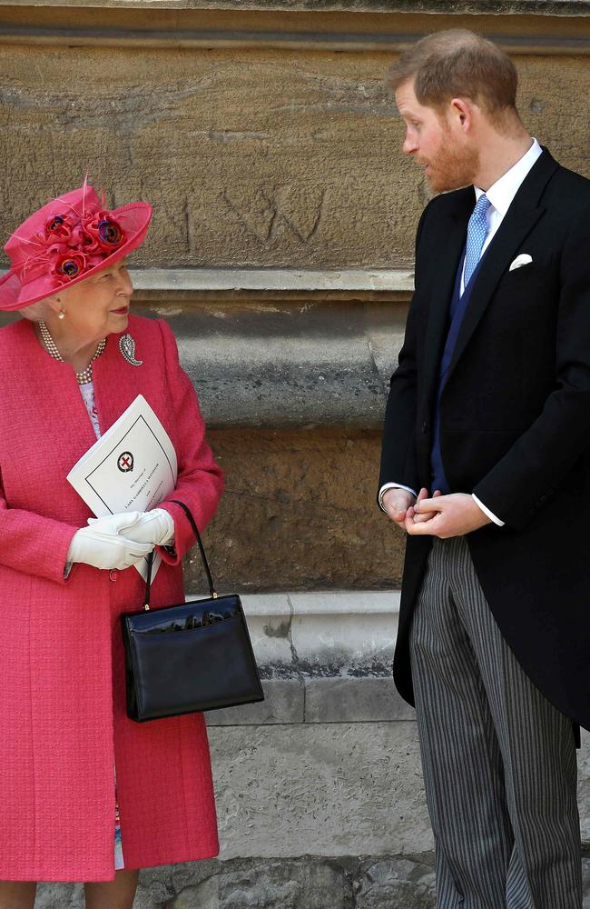 Queen Elizabeth II and Prince Harry, Duke of Sussex, leaving St George’s Chapel last year. Picture: Steve Parsons/AFP