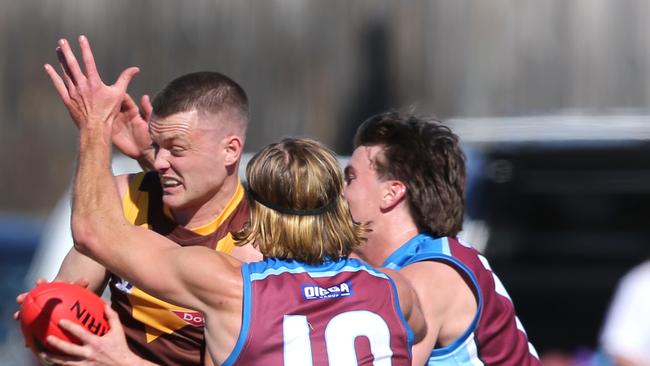 Drysdale's Ben Fennell is surrounded by Warriors. Picture: Mike Dugdale