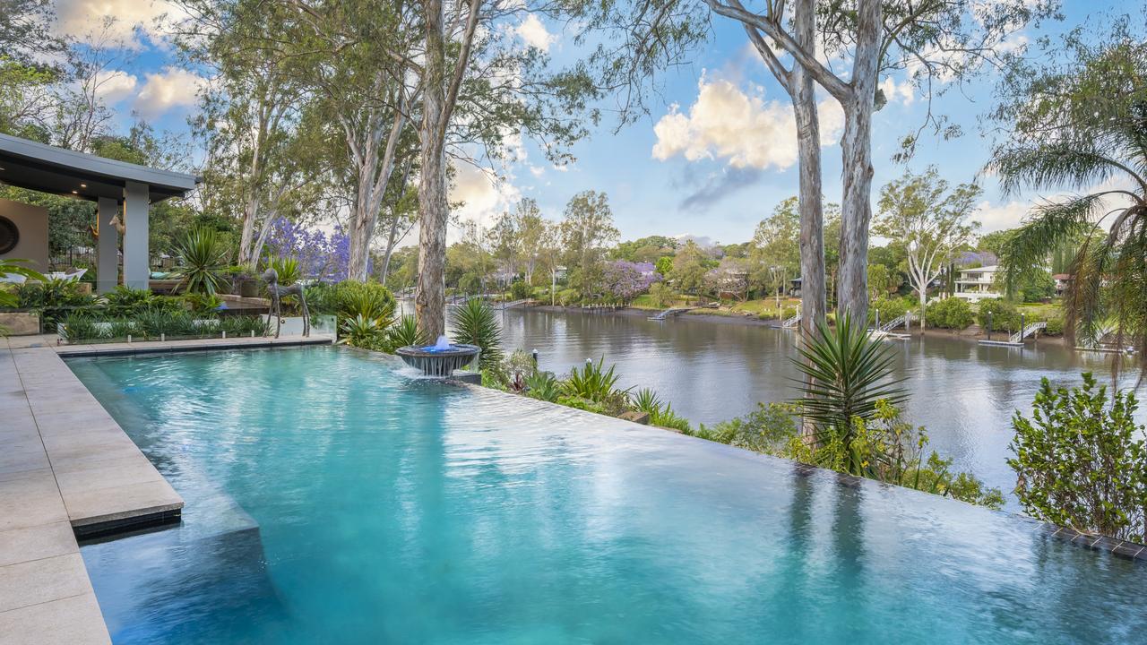 Power couple’s riverfront mansion set to smash Brisbane auction record