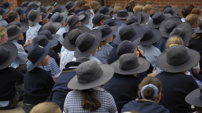 Hats are mandatory for primary school children, so why not teenagers?