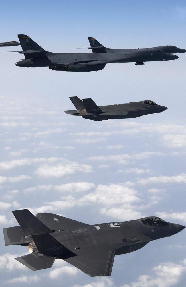 Stealth fighter jets flying over the Yellow Sea during a joint air drill between South Korea and the US. Picture: Handout/South Korean Defence Ministry/AFP