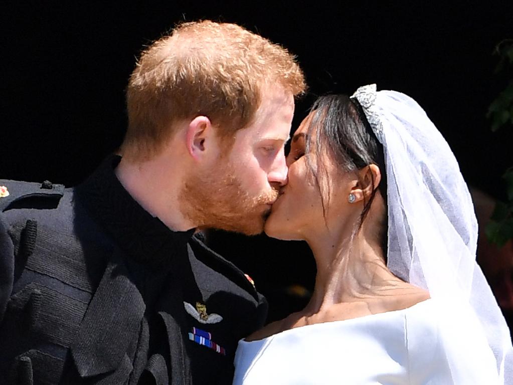 Sealed with a kiss: Unfortunately the honeymoon period from the royal wedding wasn’t to last. Picture: Ben Stansall/AFP.