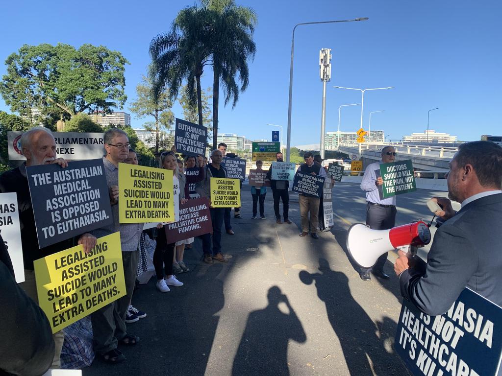 Katter’s Australian Party members addressing euthanasia protesters outside Queensland Parliament. Photo: Hayden Johnson