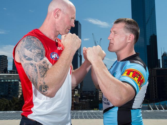 Former AFL player Barry Hall (left) and NRL Cronulla-Sutherland Sharks player Paul Gallen face off during a Code War boxing launch in Melbourne. Picure: Dave Goudie